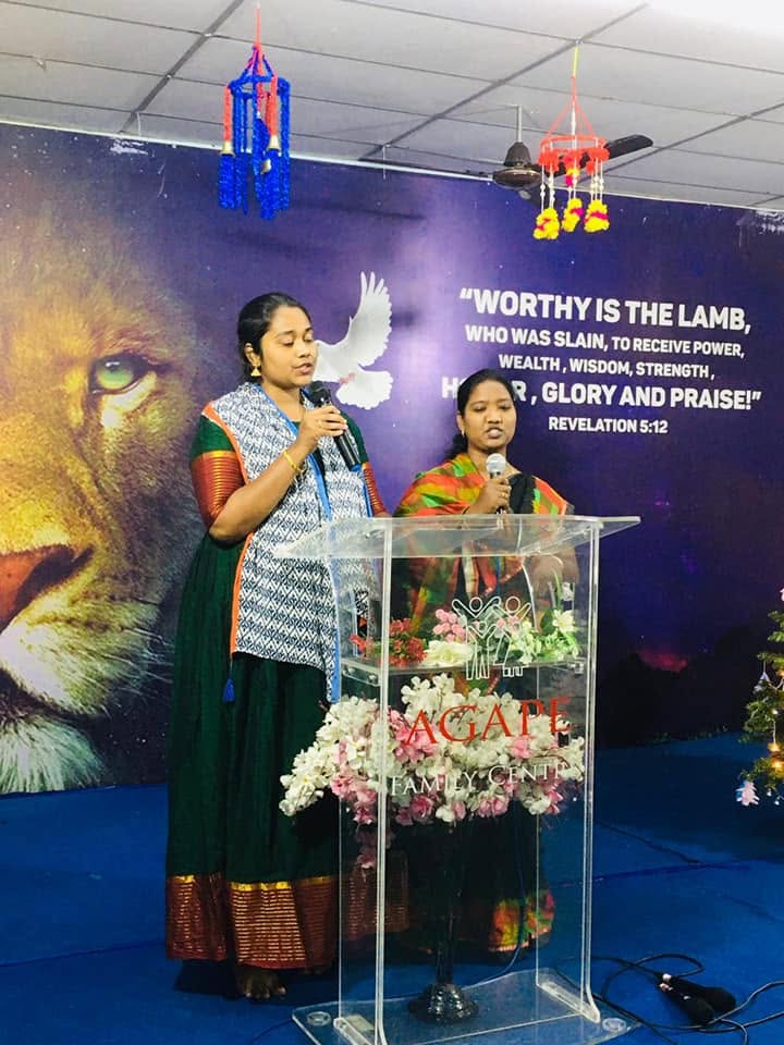 Women leading worship at Agape Family Centre