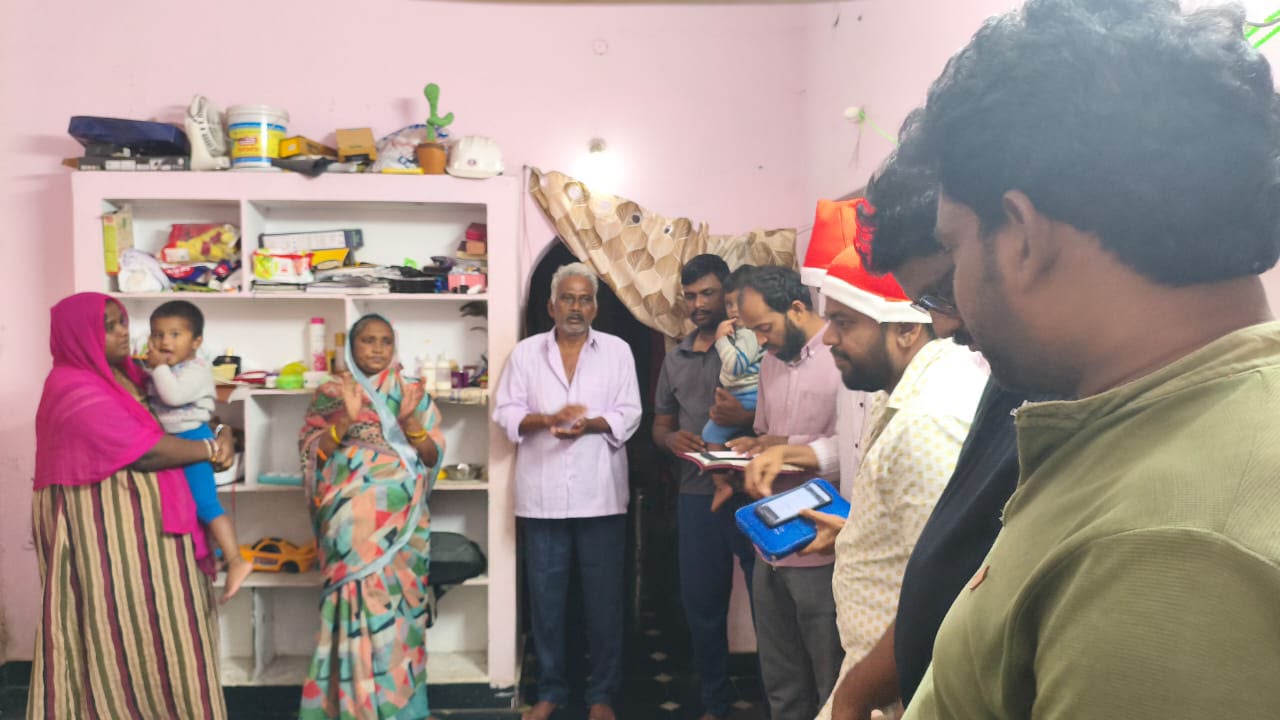Christmas Carols 2025 — family and carol singers gathered at home