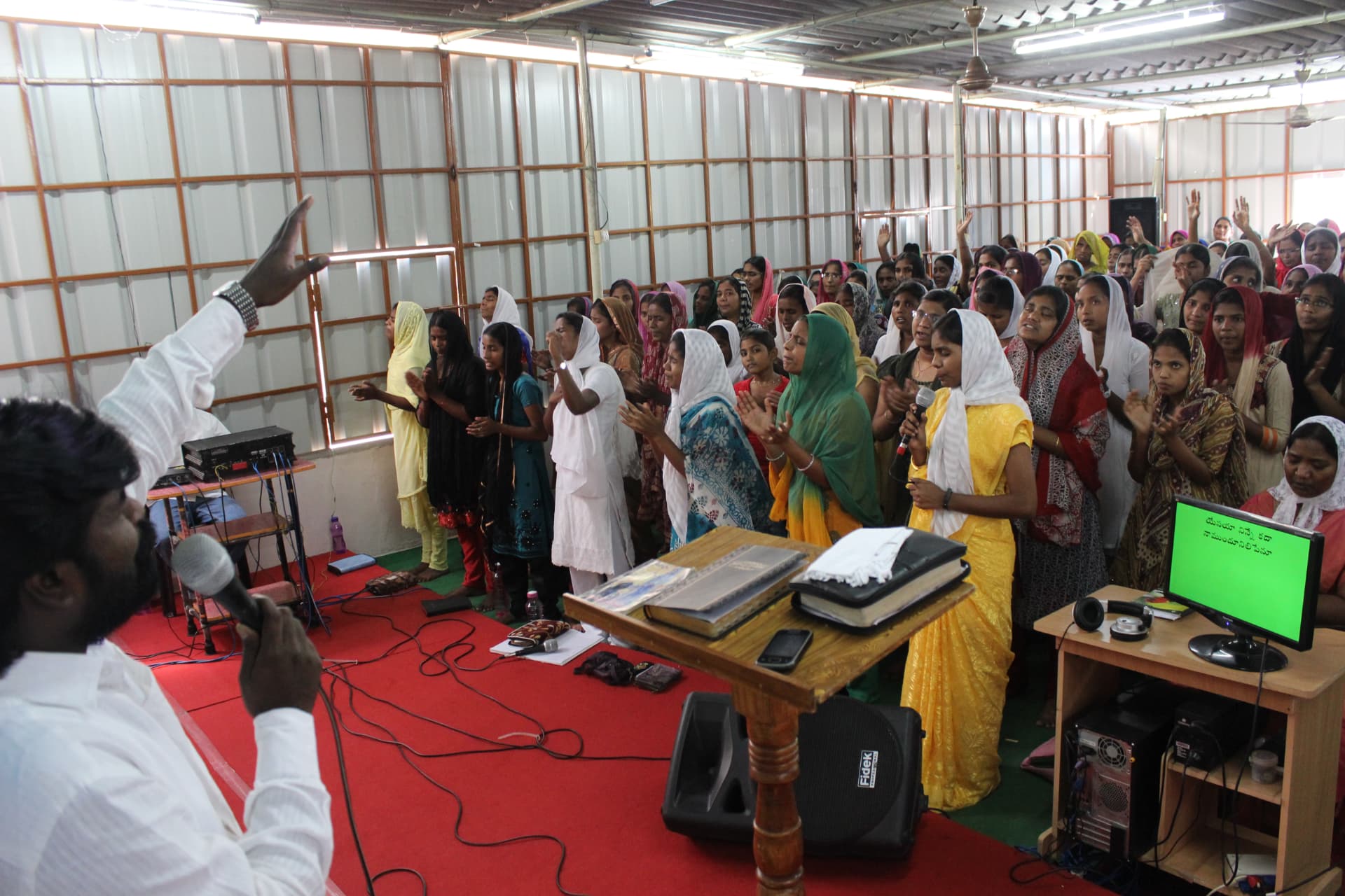 Congregation praising together during a church service